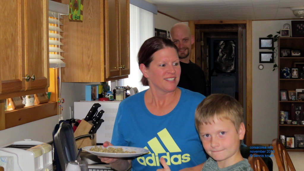 Kelly serving the first plate of turkey