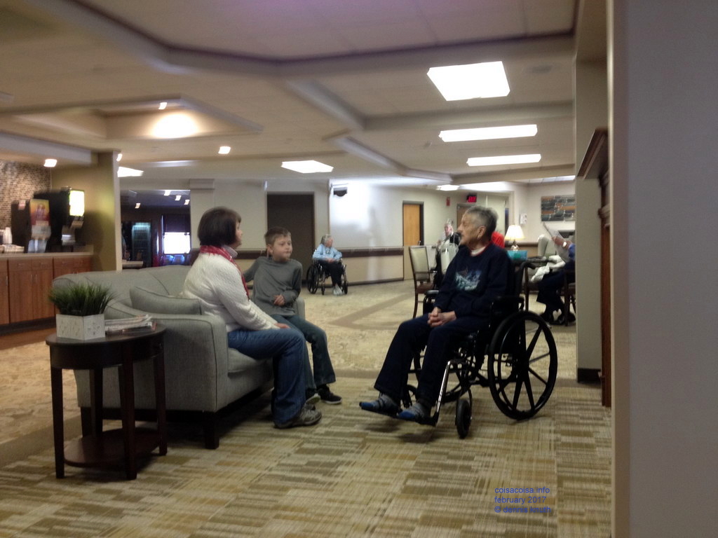 Emogoene, Sherri and Jared in a common area of Dove Healthcare