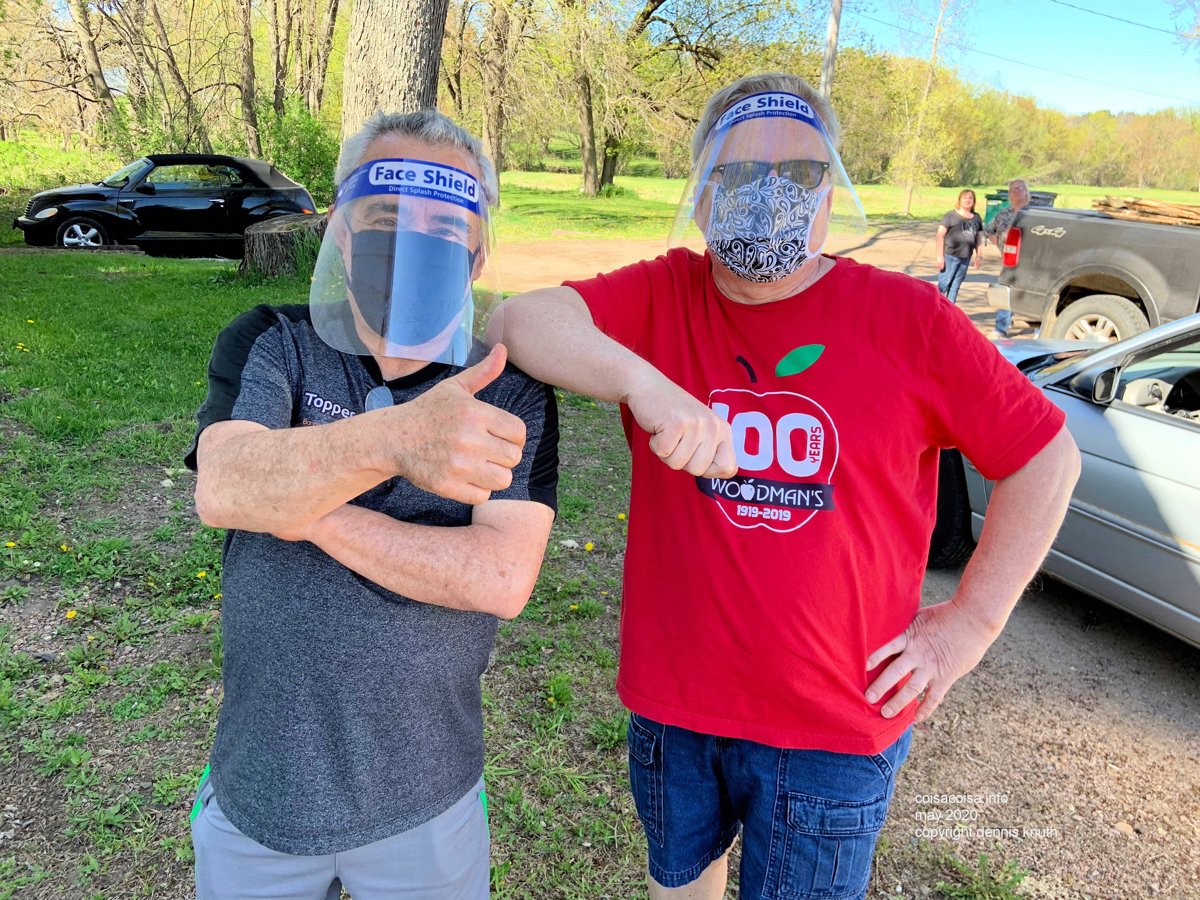 Helton Knuth and Dennis wearing masks and shields